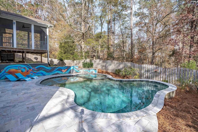 view of pool featuring a sunroom and a patio