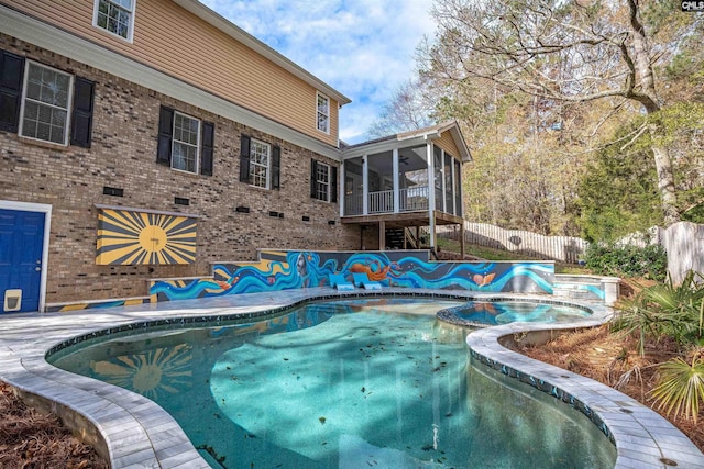 view of pool with a sunroom