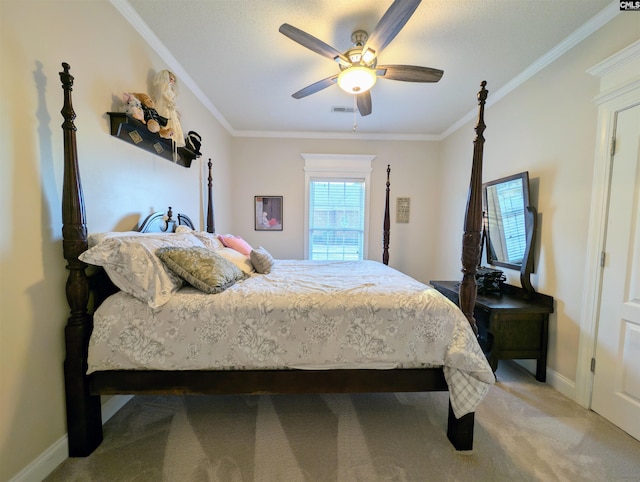 bedroom featuring crown molding, carpet, and ceiling fan