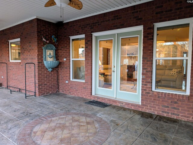 view of patio with ceiling fan and french doors