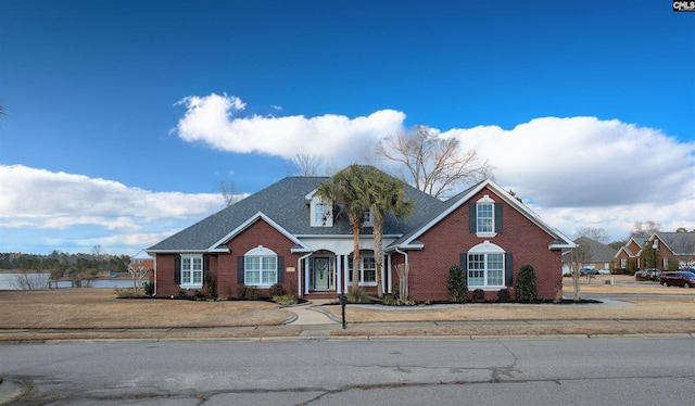 view of front facade featuring a front yard