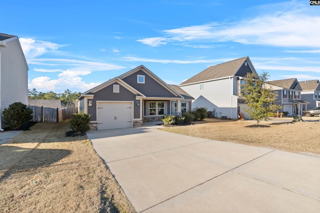 view of front of house with a garage and a front lawn