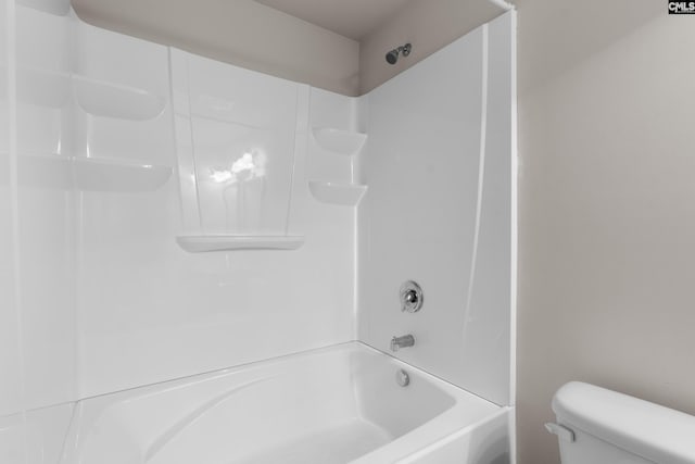 bathroom with toilet and shower / bathtub combination