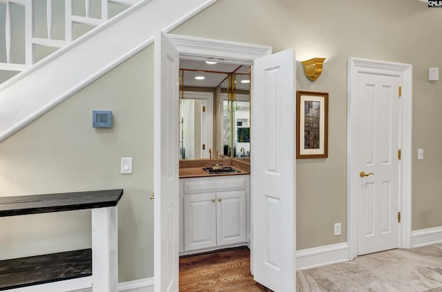 106 Stonebrook Dr, Blythewood, SC 29016 - corridor with sink and light hardwood / wood-style floors