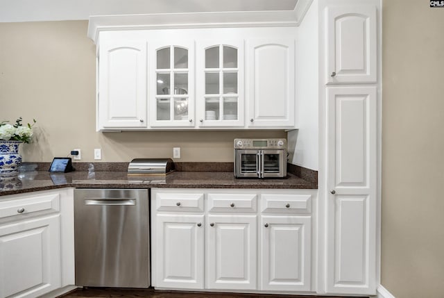 106 Stonebrook Dr, Blythewood, SC 29016 - kitchen with white cabinetry and dark stone countertops