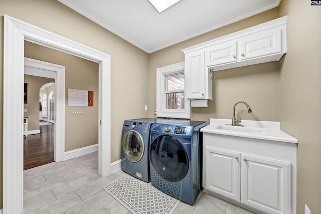 106 Stonebrook Dr, Blythewood, SC 29016 - washroom with cabinets, sink, washer and clothes dryer, and crown molding