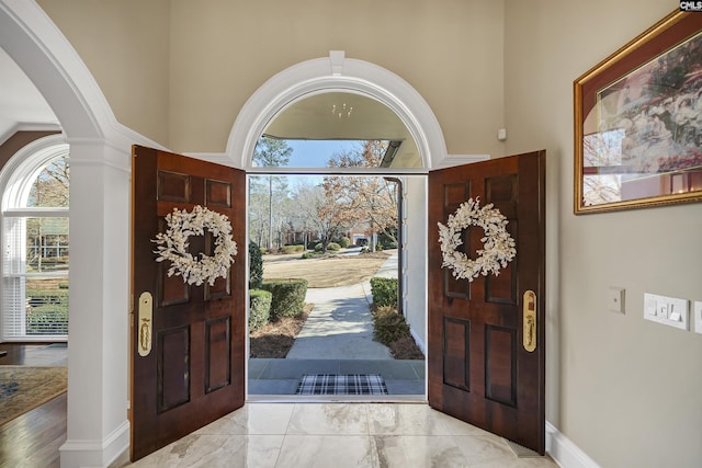 entrance foyer featuring plenty of natural light