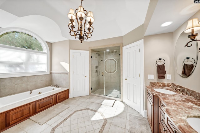 106 Stonebrook Dr, Blythewood, SC 29016 - bathroom with vanity, shower with separate bathtub, a notable chandelier, and tile patterned flooring