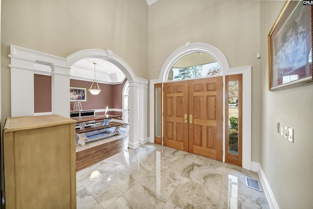 106 Stonebrook Dr, Blythewood, SC 29016 - foyer featuring decorative columns and a towering ceiling