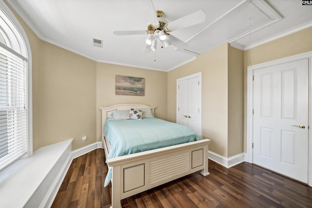 106 Stonebrook Dr, Blythewood, SC 29016 - bedroom with a closet, ceiling fan, crown molding, and dark hardwood / wood-style flooring