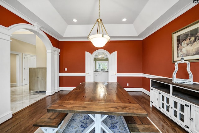 106 Stonebrook Dr, Blythewood, SC 29016 - dining space with a raised ceiling, ornate columns, and crown molding