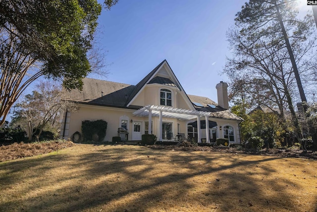 106 Stonebrook Dr, Blythewood, SC 29016 - rear view of house featuring a lawn and a pergola