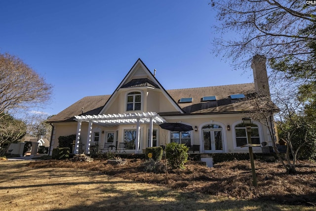 106 Stonebrook Dr, Blythewood, SC 29016 - rear view of house with french doors and a pergola
