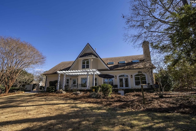 106 Stonebrook Dr, Blythewood, SC 29016 - back of property featuring a yard, a pergola, and french doors