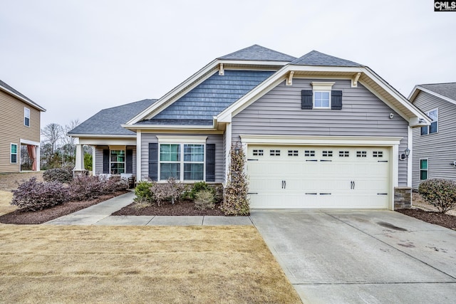 craftsman-style home with a garage