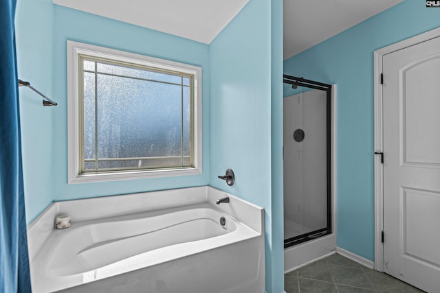 bathroom featuring shower with separate bathtub and tile patterned floors