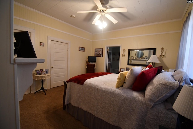 bedroom with crown molding, ceiling fan, and carpet floors