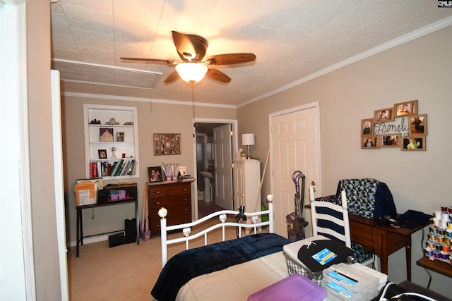 carpeted bedroom with crown molding and ceiling fan