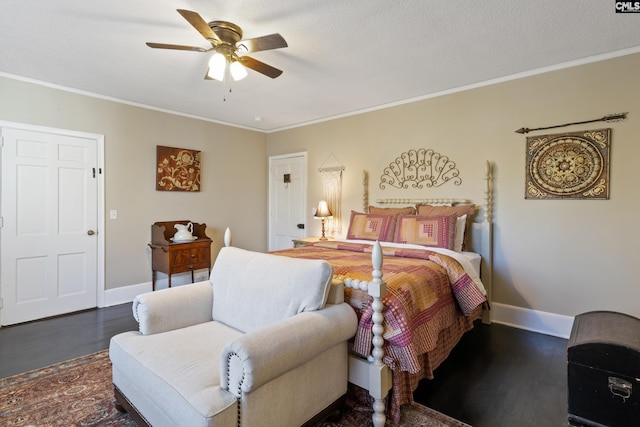 bedroom with ceiling fan, ornamental molding, and dark hardwood / wood-style flooring