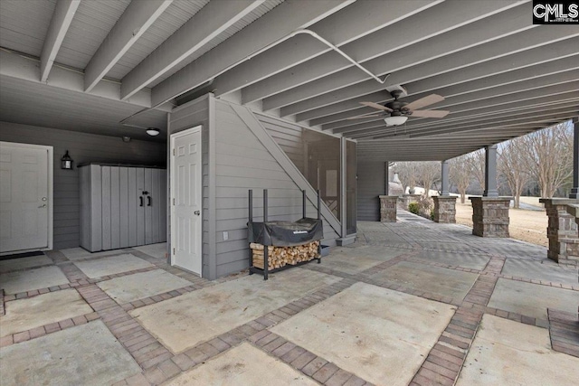 view of patio featuring ceiling fan