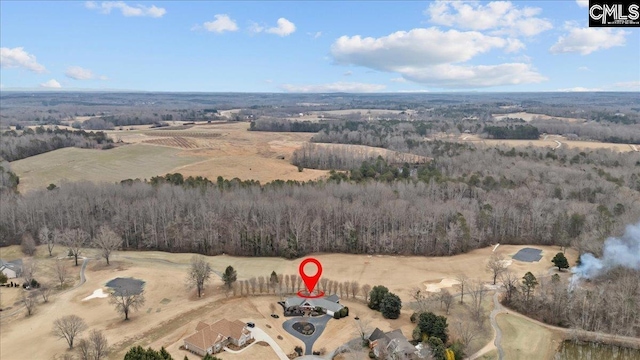 birds eye view of property with a rural view