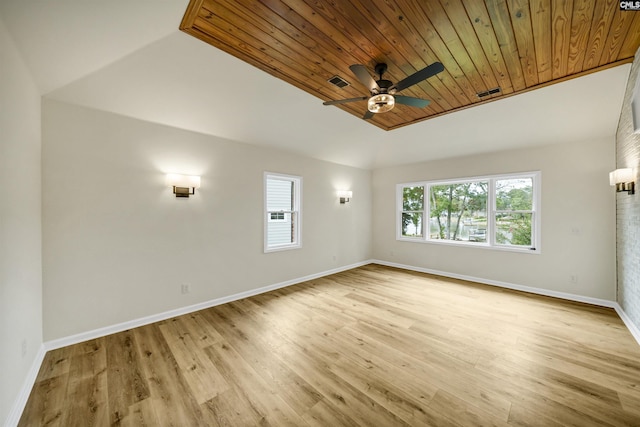 unfurnished room featuring wooden ceiling, light hardwood / wood-style flooring, vaulted ceiling, and ceiling fan