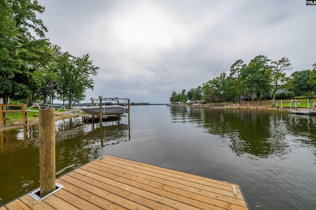 dock area with a water view