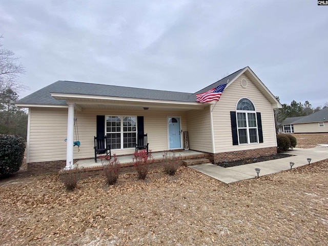 view of front of house featuring covered porch