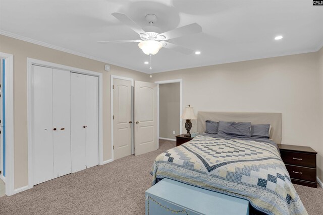 bedroom featuring ceiling fan, ornamental molding, and carpet floors