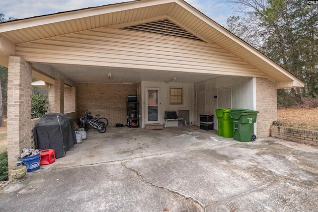 garage featuring a carport