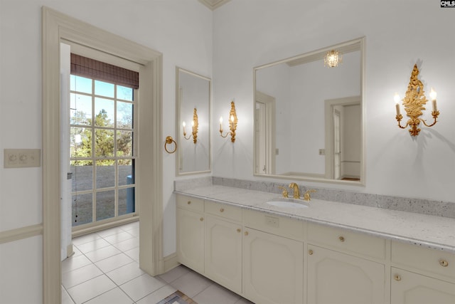 bathroom with tile patterned floors and vanity