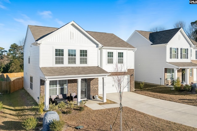 view of front facade with a garage and a front yard