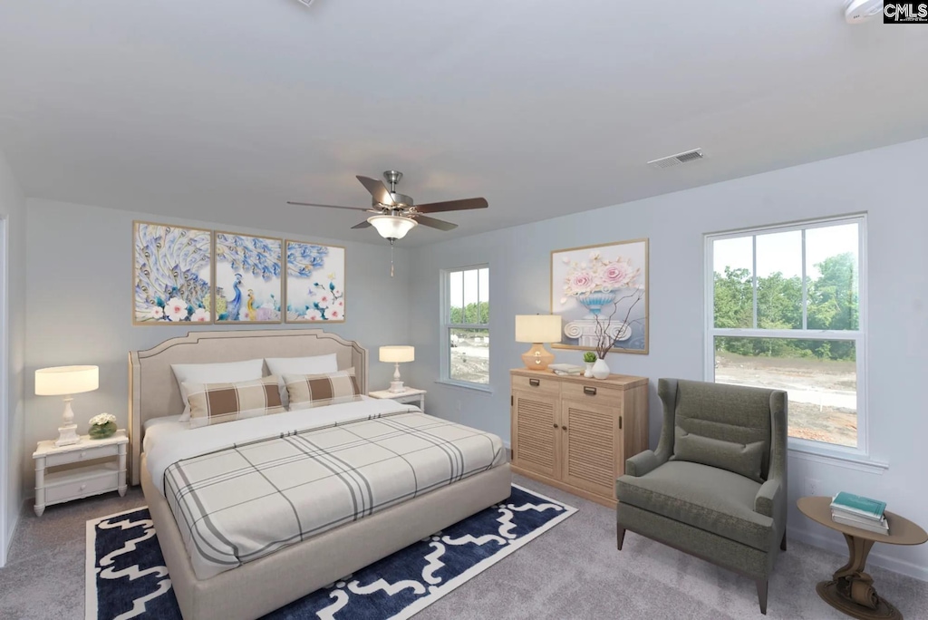 carpeted bedroom featuring ceiling fan