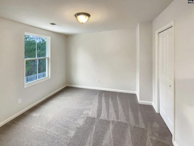 view of carpeted spare room