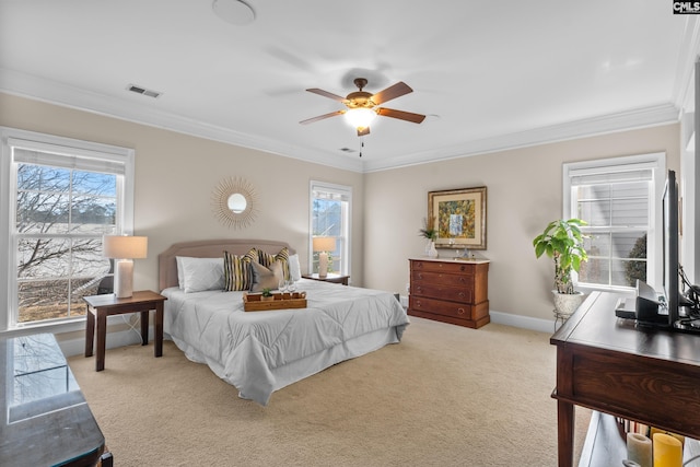 bedroom featuring light carpet, ceiling fan, and ornamental molding