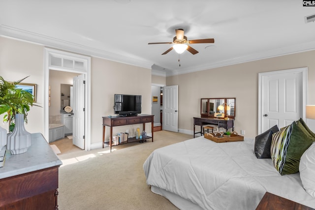 bedroom featuring ceiling fan, light colored carpet, ensuite bath, and crown molding