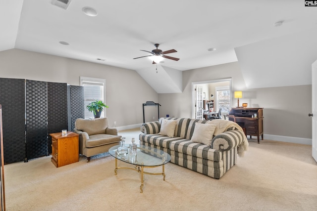 carpeted living room featuring lofted ceiling, plenty of natural light, and ceiling fan