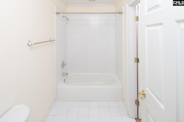 bathroom featuring bathing tub / shower combination, ornamental molding, and toilet