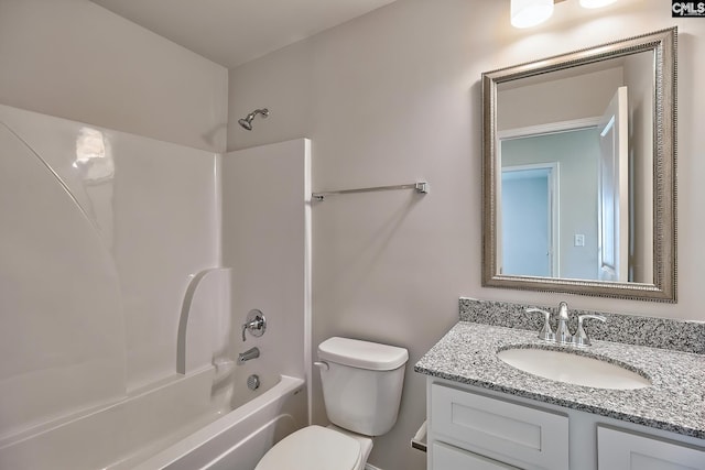 full bathroom with vanity, bathing tub / shower combination, and toilet