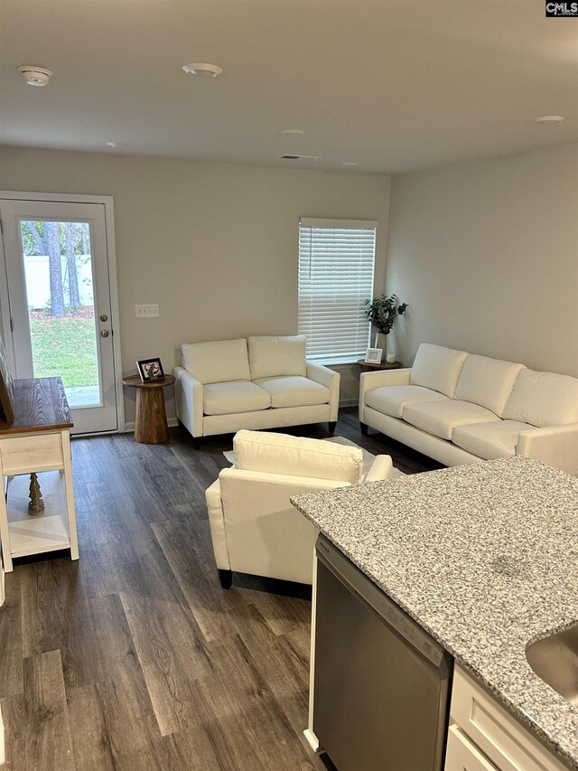 living room featuring dark hardwood / wood-style floors