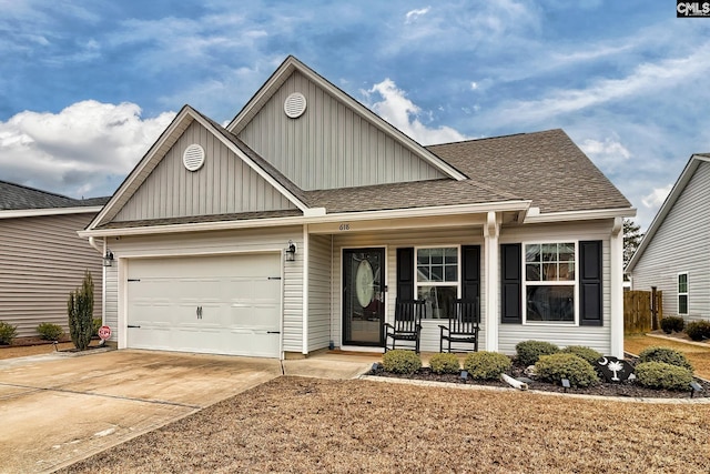 view of front of house featuring a garage and covered porch