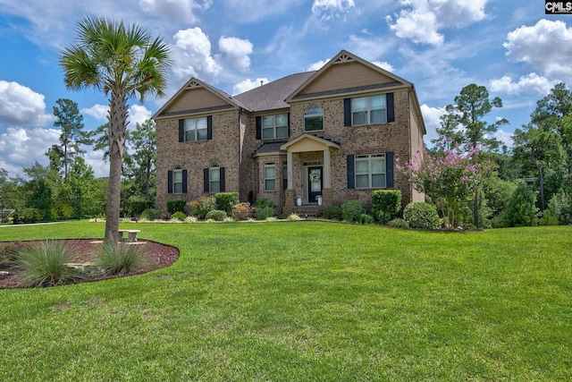 craftsman house with a front lawn