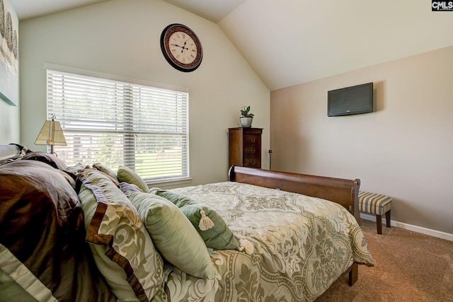 bedroom with carpet and lofted ceiling