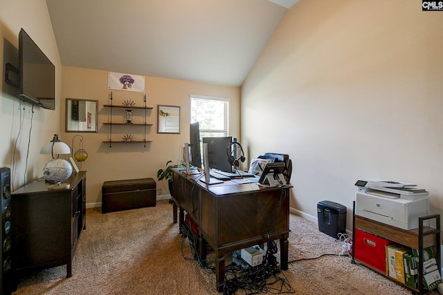 carpeted office space with vaulted ceiling
