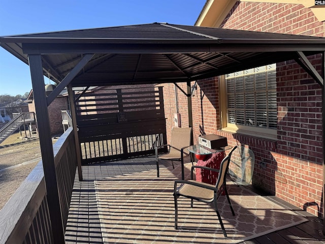 wooden deck with a gazebo