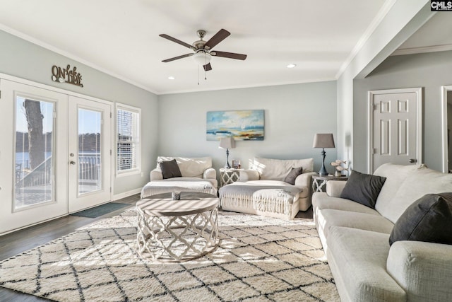 living room with ceiling fan, french doors, ornamental molding, and hardwood / wood-style floors