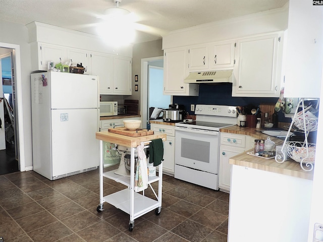 kitchen featuring a textured ceiling, white appliances, and white cabinetry