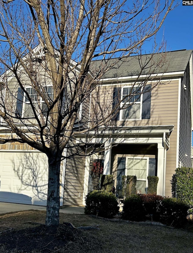 view of front of property with a garage