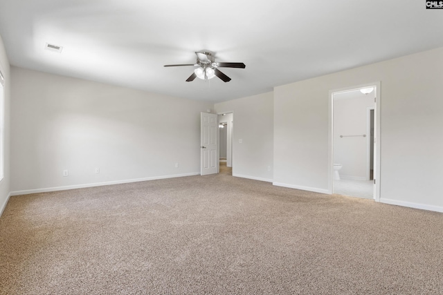 unfurnished room featuring light colored carpet and ceiling fan