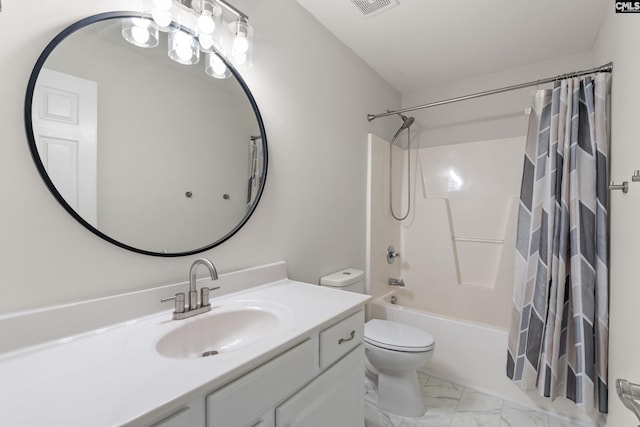 full bathroom with vanity, toilet, and shower / tub combo